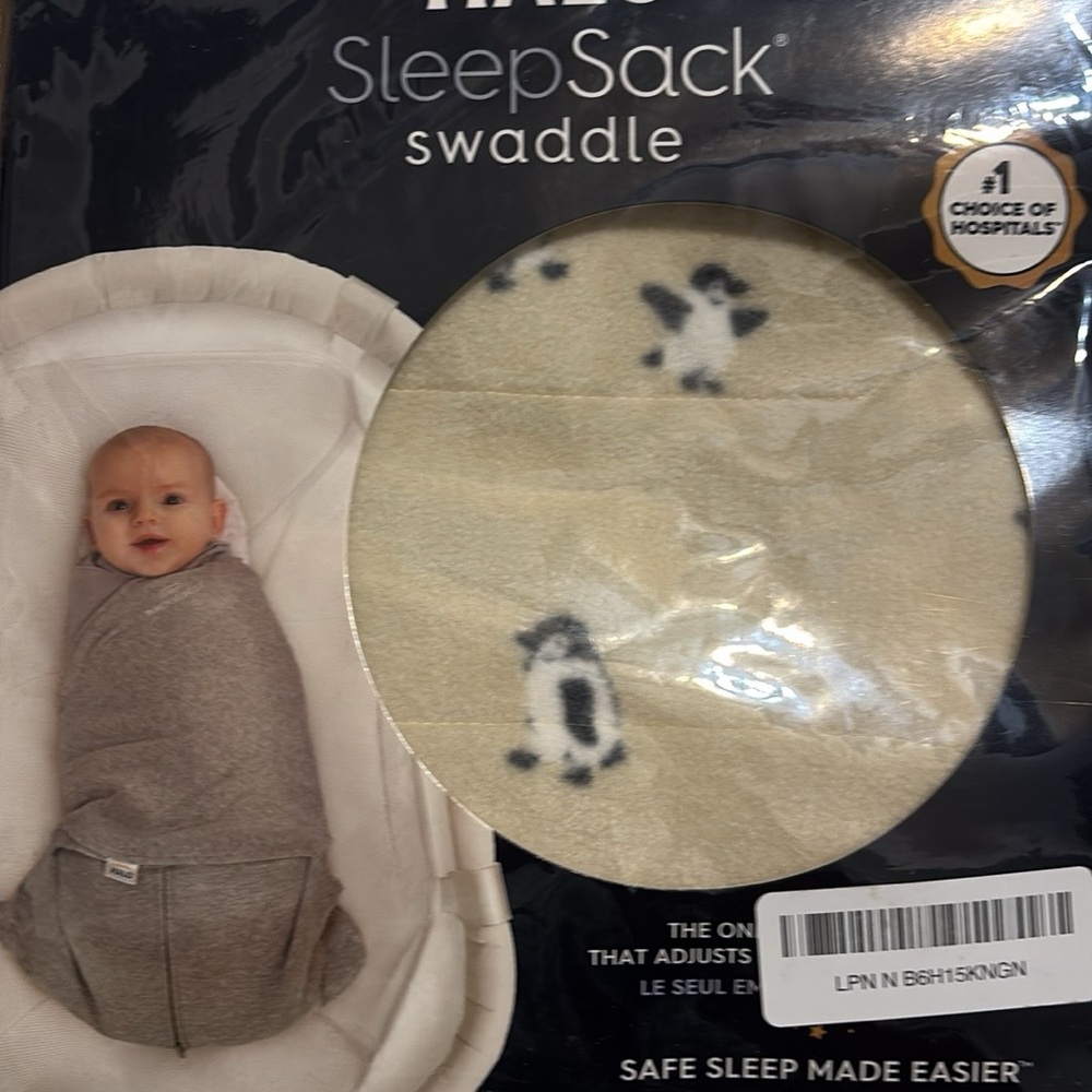 Halo Cream Swaddle SleepSack with Penguin Motif